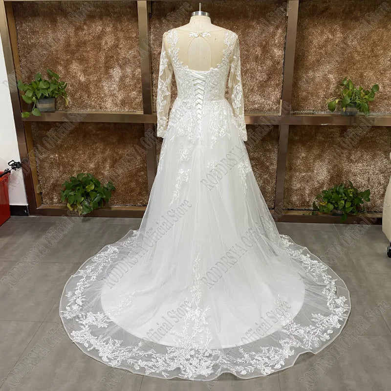 Elegant O-Neck Wedding Dress - Lace-Up A-Line Applique Tulle Long Sleeve Gown - JStorehub 