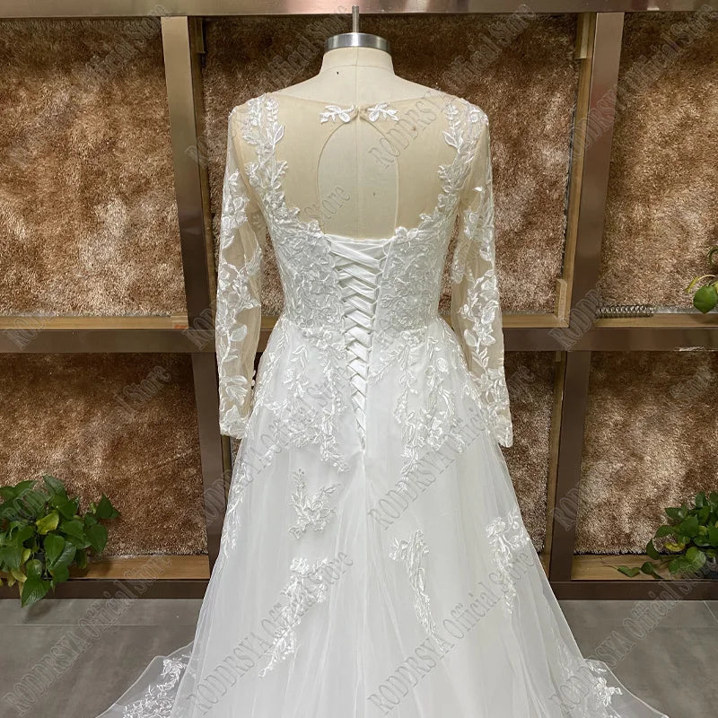 Elegant O-Neck Wedding Dress - Lace-Up A-Line Applique Tulle Long Sleeve Gown - JStorehub 